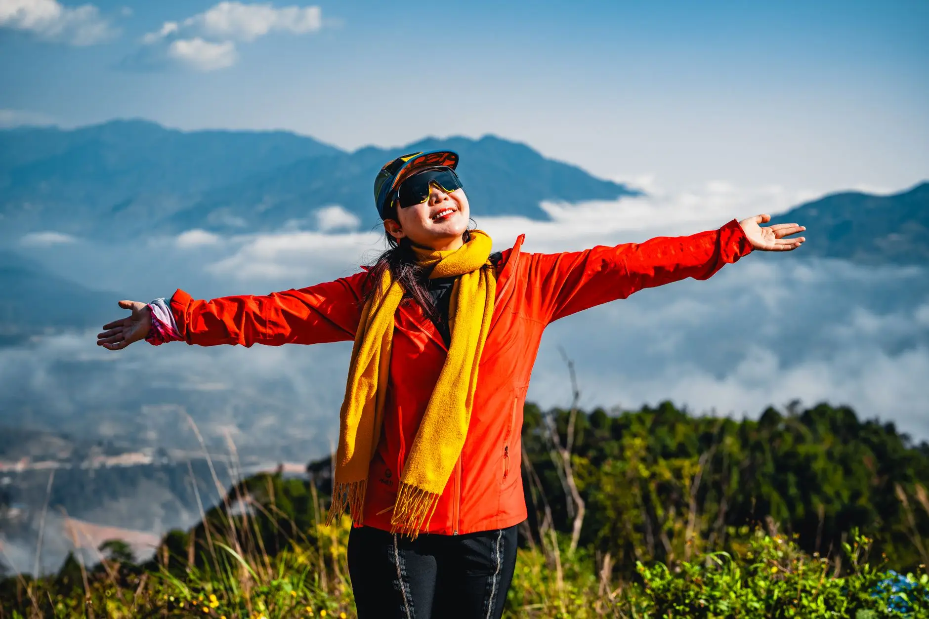 joyful hiker embracing nature in mountain landscape